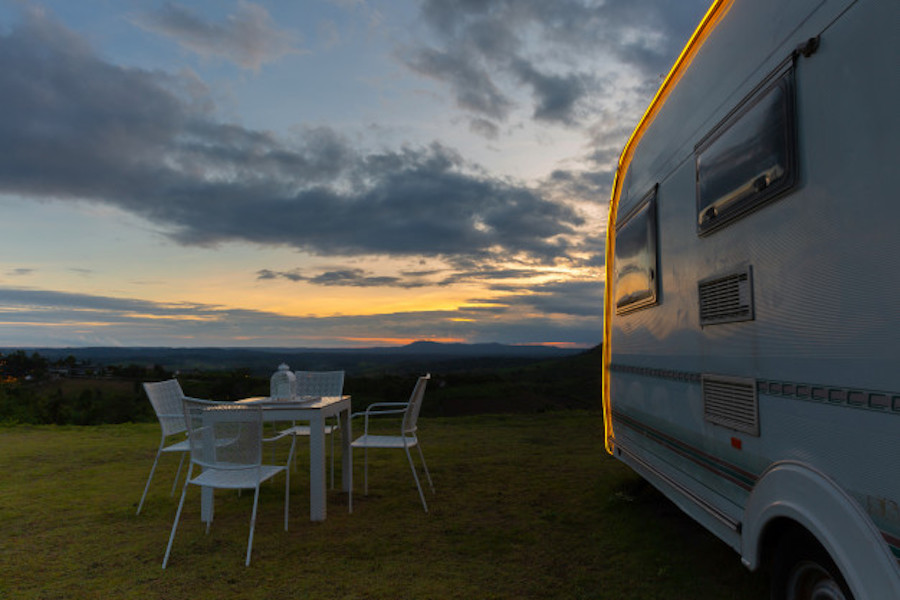 campsite-with-caravans-dusk-time_1150-18079